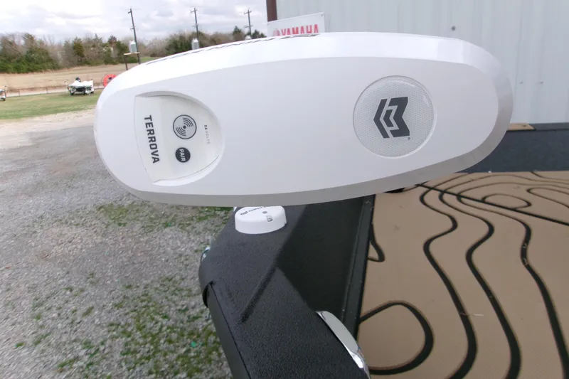 Slide: The Image of 2026 Xpress H22B Bay boat with Terrova trolling motor, outdoor setting. - 8