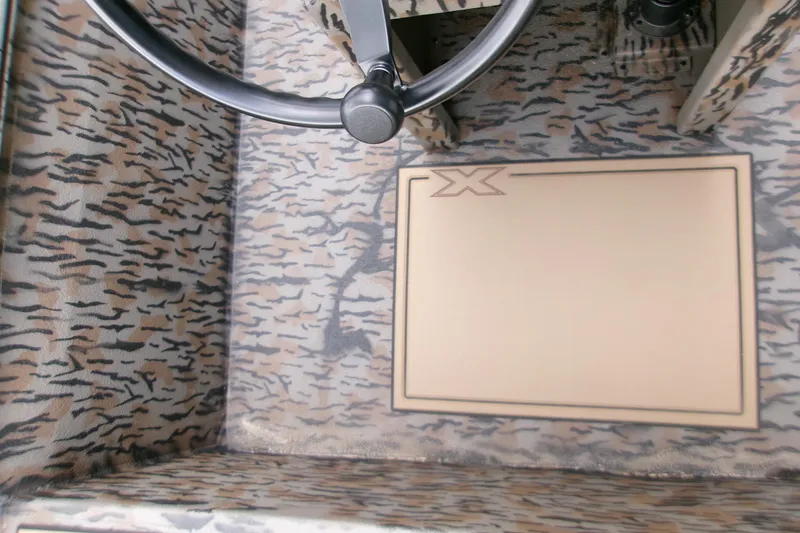Slide: The Image of 2026 Xpress Bayou 180CC interior with camouflage design and steering wheel. - 20