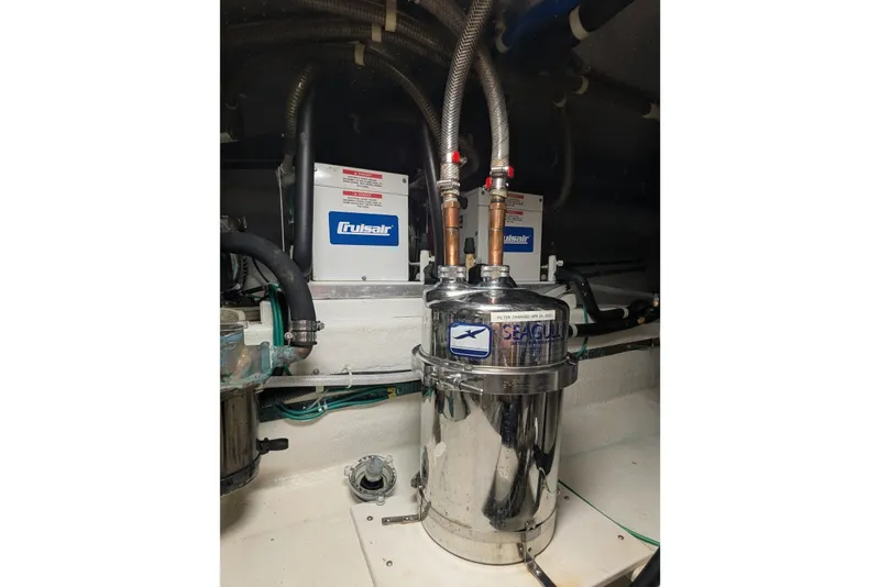 Slide: The Image of Engine room of 2005 Kadey-Krogen Pilothouse with Seagull water filter and Cruisair units. - 101