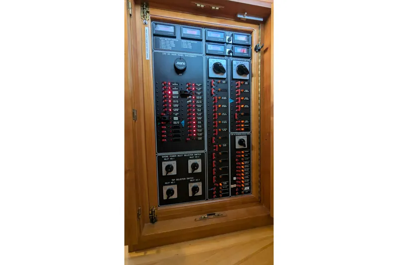 Slide: The Image of Electrical control panel inside a 2005 Kadey-Krogen Pilothouse boat. - 117