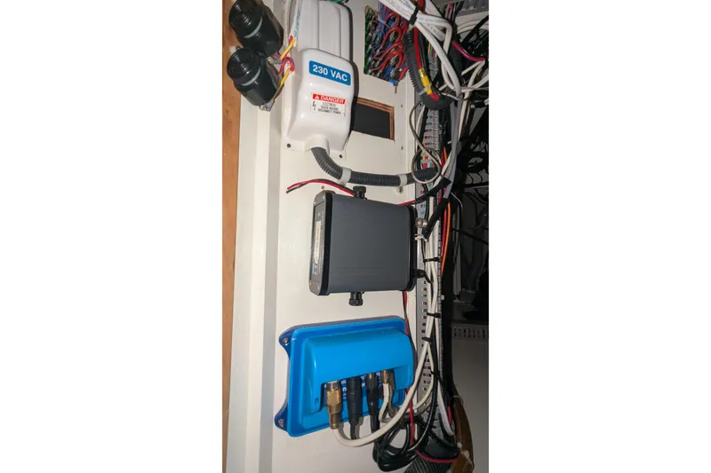 Slide: The Image of Electrical panel of 2005 Kadey-Krogen Pilothouse with wiring and components. - 124