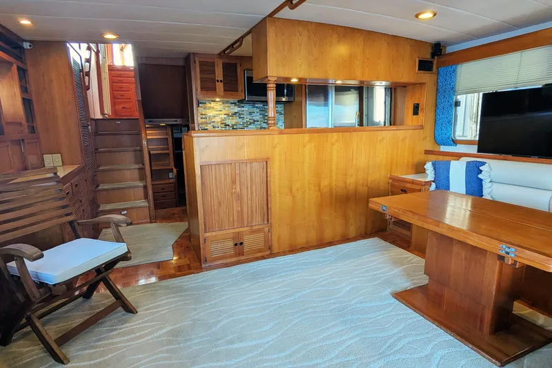 Slide: The Image of Luxurious 2005 Kadey-Krogen Pilothouse interior with wood finishes and modern amenities. - 131