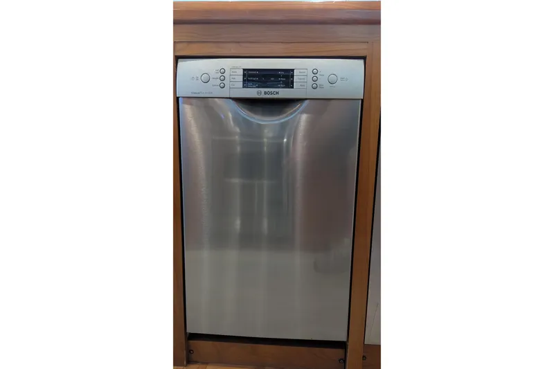 Slide: The Image of Bosch stainless steel dishwasher in Kadey-Krogen 2005 Pilothouse kitchen. - 140