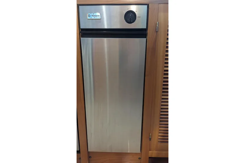 Slide: The Image of Stainless steel appliance in Kadey-Krogen Pilothouse, 2005 model, with wooden cabinetry. - 141