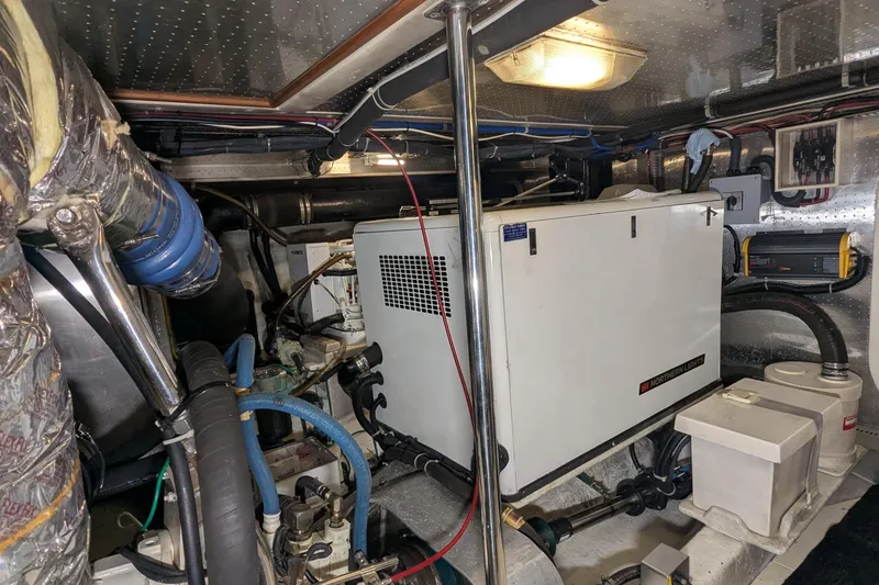 Slide: The Image of Engine room of 2005 Kadey-Krogen Pilothouse with Northern Lights generator and wiring. - 154