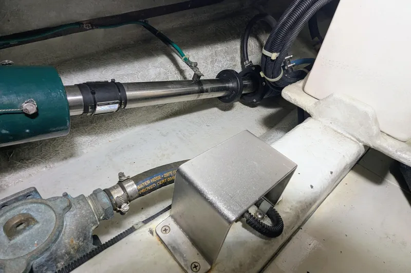 Slide: The Image of Engine room of 2005 Kadey-Krogen Pilothouse showing mechanical components and wiring. - 160