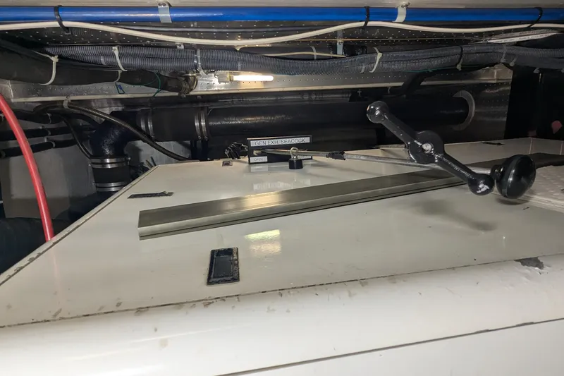 Slide: The Image of Engine room of 2005 Kadey-Krogen Pilothouse with mechanical components and piping. - 167