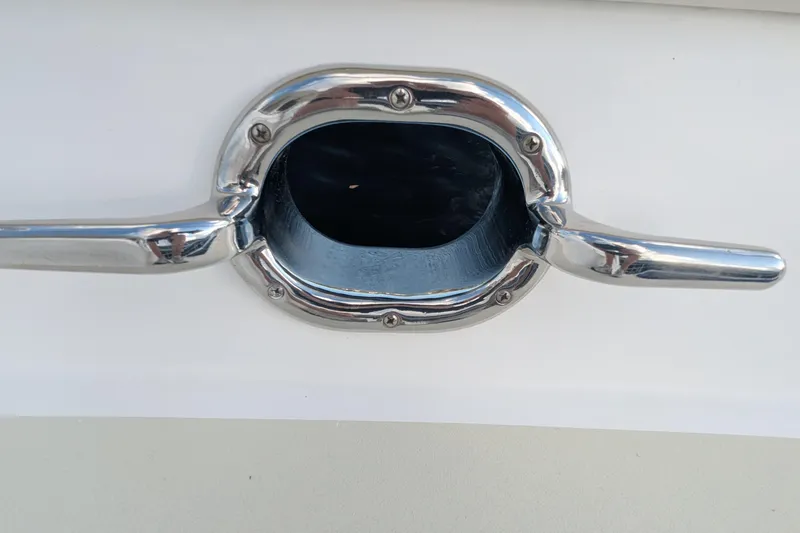 Slide: The Image of Chrome cleat on 2005 Kadey-Krogen Pilothouse boat, mounted on white surface. - 31