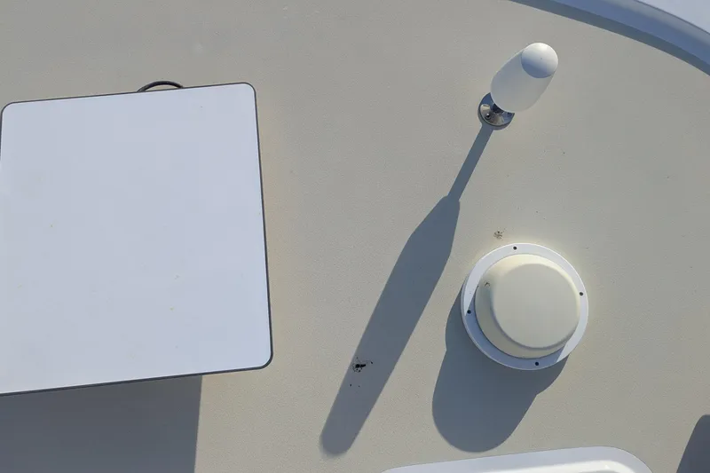 Slide: The Image of 2005 Kadey-Krogen Pilothouse deck with antenna and hatch details. - 47