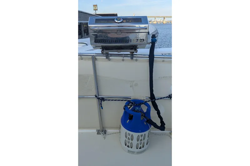Slide: The Image of Outdoor grill setup on 2005 Kadey-Krogen Pilothouse boat with propane tank. - 60