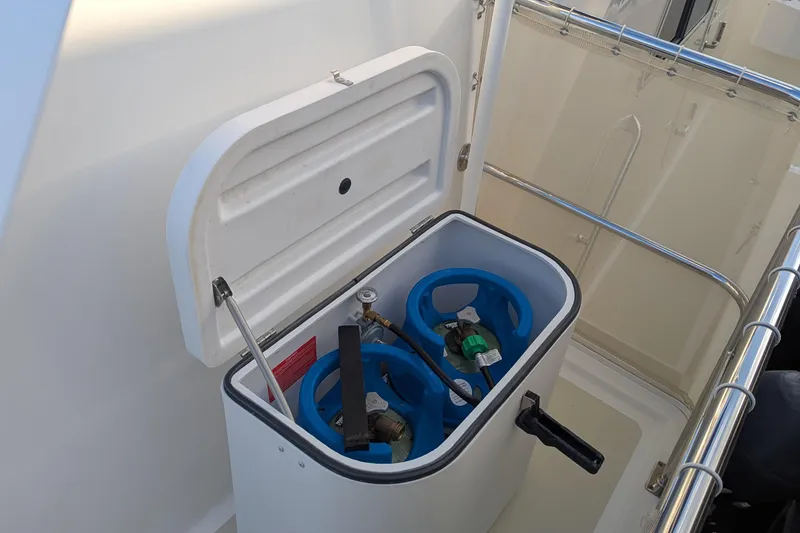 Slide: The Image of Storage compartment on 2005 Kadey-Krogen Pilothouse boat with propane tanks. - 61