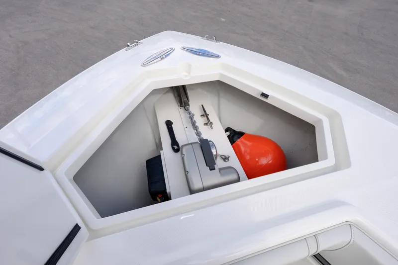 Slide: The Image of 2021 SeaVee 322Z boat anchor compartment with chain and orange buoy. - 17