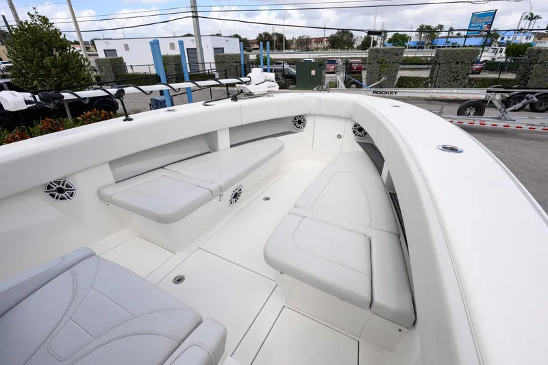 Slide: The Image of 2021 SeaVee 322Z boat interior with cushioned seating and modern design. - 18