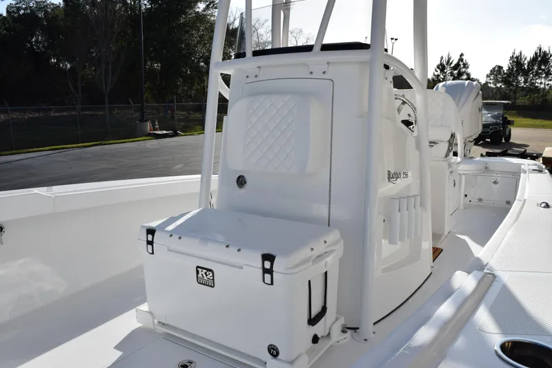 Slide: The Image of 2026 BlackJack 256 Coastal boat interior with seating and storage features. - 12