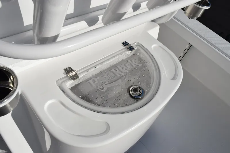 Slide: The Image of Livewell on 2026 BlackJack 256 Coastal boat, featuring a clear lid and stainless steel cup holder. - 16