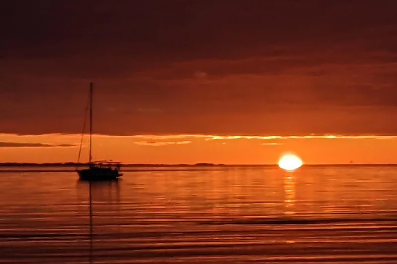 Slide: The Image of Cockpit of 1994 Passport Royal Passport 44 sailboat with steering wheel and navigation equipment. - 7