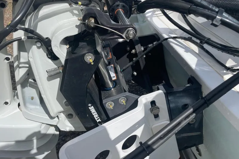 Slide: The Image of 2023 Sea Pro 248 Bay boat engine components and hydraulic system close-up. - 33