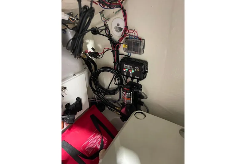 Slide: The Image of 2023 Sea Pro 248 Bay boat wiring and battery setup with NOCO Genius charger. - 36
