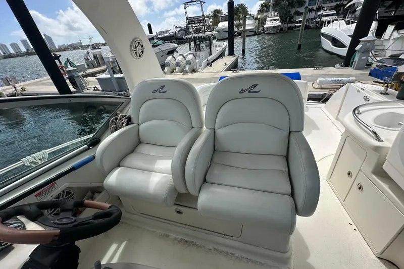 Slide: The Image of Luxury seating on 2008 Sea Ray 340 Sundancer yacht at marina. - 26