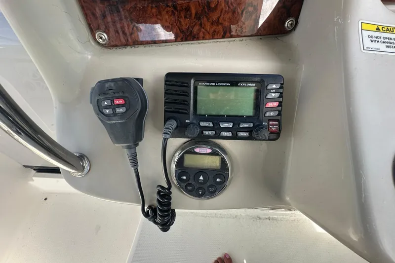 Slide: The Image of Control panel of 2008 Sea Ray 340 Sundancer with radio and microphone. - 39