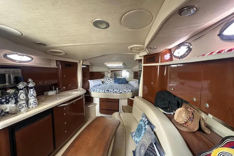 Slide: The Image of Luxurious interior of 2008 Sea Ray 340 Sundancer yacht with cozy seating and stylish decor. - 59