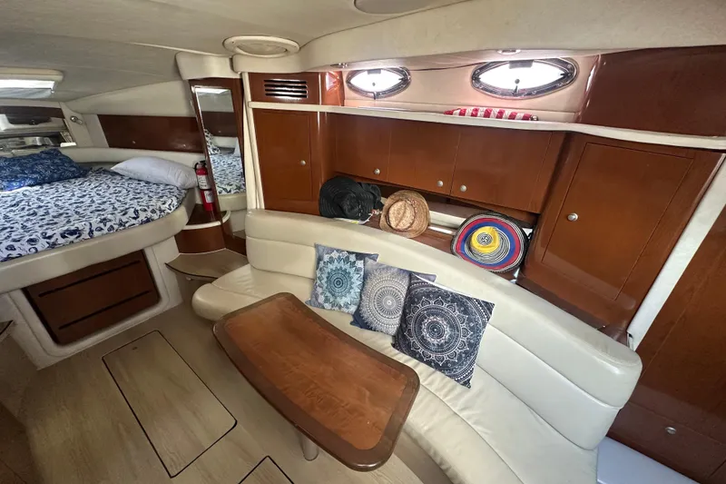Slide: The Image of Interior of 2008 Sea Ray 340 Sundancer with cozy seating and stylish decor. - 61