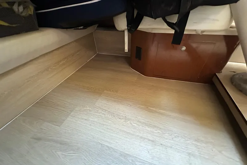 Slide: The Image of Interior view of 2008 Sea Ray 340 Sundancer with wooden flooring and seating area. - 70