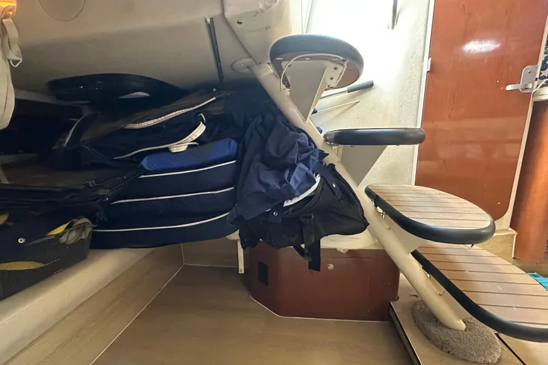 Slide: The Image of Interior of 2008 Sea Ray 340 Sundancer with storage under stairs. - 71
