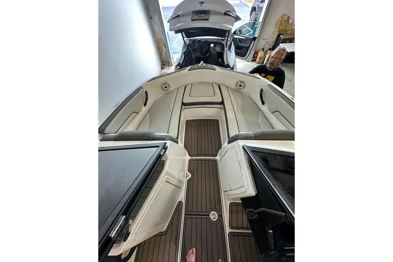 Slide: The Image of 2020 Yamaha Boats AR190 interior with seating and flooring, viewed from above. - 11