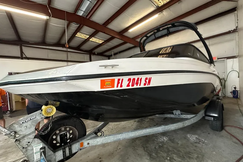 Slide: The Image of 2020 Yamaha Boats AR190 on trailer in indoor storage facility. - 3