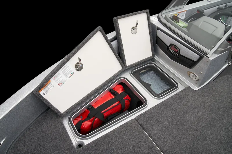 Slide: The Image of Manufacturer Provided Image: 2026 Ranger 1880MS boat storage compartment with safety equipment and secure latches. - 24