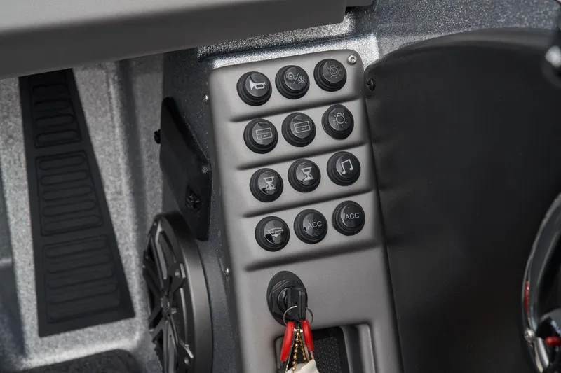 Slide: The Image of Manufacturer Provided Image: Control panel of 2026 Ranger 1880MS boat with labeled buttons and ignition keys. - 39