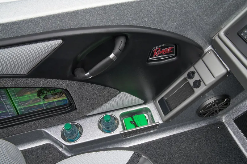Slide: The Image of Manufacturer Provided Image: Interior of 2026 Ranger 1880MS boat with cup holders and control panel. - 46
