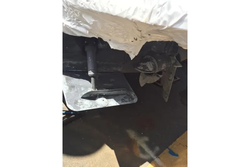 Slide: The Image of 2007 Ranger Tugs R-25 SC boat propeller and rudder detail, partially covered. - 43