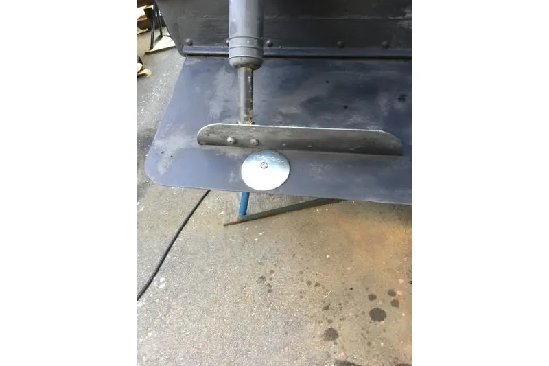 Slide: The Image of 2007 Ranger Tugs R-25 SC boat rudder and trim tab detail. - 44