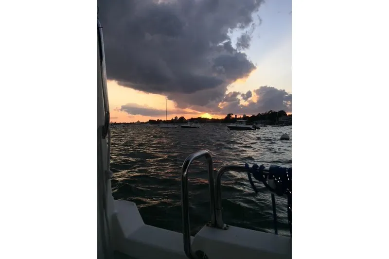 Slide: The Image of Sunset view from 2007 Ranger Tugs R-25 SC boat on a cloudy evening. - 18