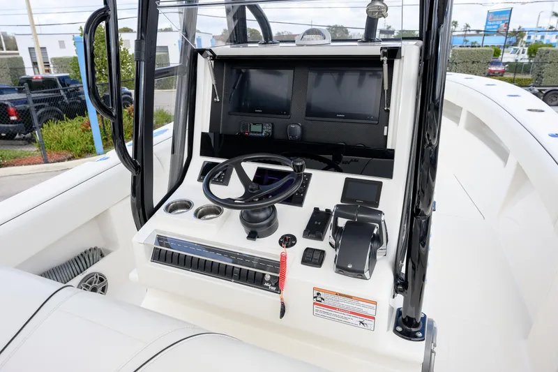Slide: The Image of 2025 SeaVee 290B boat console with modern navigation and control systems. - 5