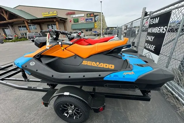 Slide: The Image of 2026 Sea-Doo PWC SPARK TRIXX 90 on trailer, blue and orange. - 18