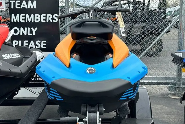 Slide: The Image of 2026 Sea-Doo PWC SPARK TRIXX 90 in blue and orange on trailer. - 20