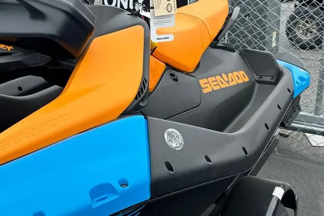 Slide: The Image of 2026 Sea-Doo PWC SPARK TRIXX 90 in orange and blue. - 7