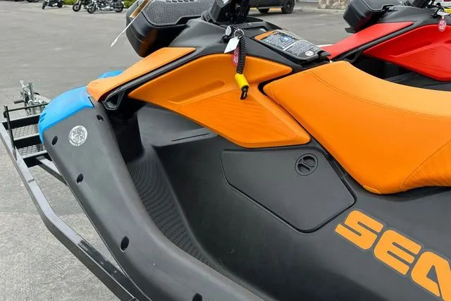 Slide: The Image of 2026 Sea-Doo PWC SPARK TRIXX 90 with orange seat. - 9