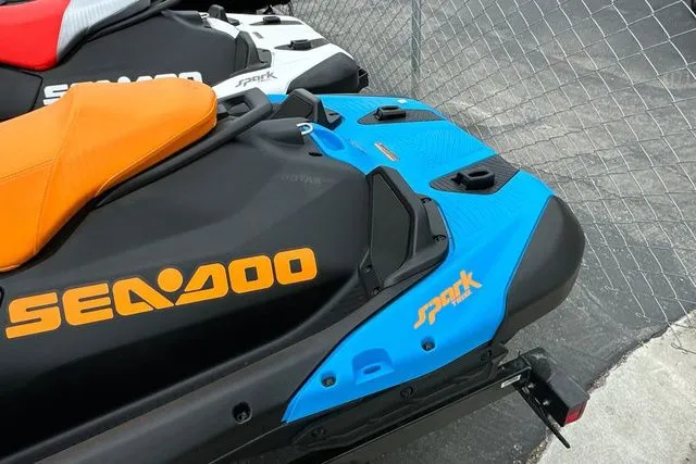 Slide: The Image of 2026 Sea-Doo SPARK TRIXX 90, blue and black, on trailer. - 10
