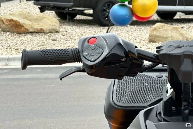Slide: The Image of Handlebar of 2026 Sea-Doo PWC SPARK TRIXX with control buttons. - 14