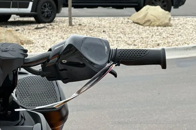 Slide: The Image of Close-up of the handlebar on a 2026 Sea-Doo PWC SPARK TRIXX. - 16