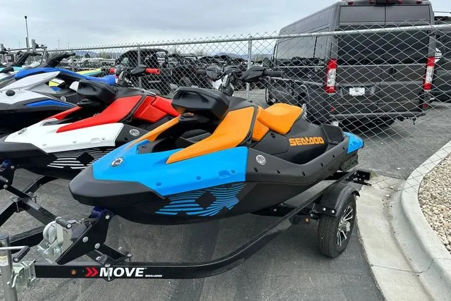 Slide: The Image of 2026 Sea-Doo PWC SPARK TRIXX 90 on trailer, blue and orange. - 19