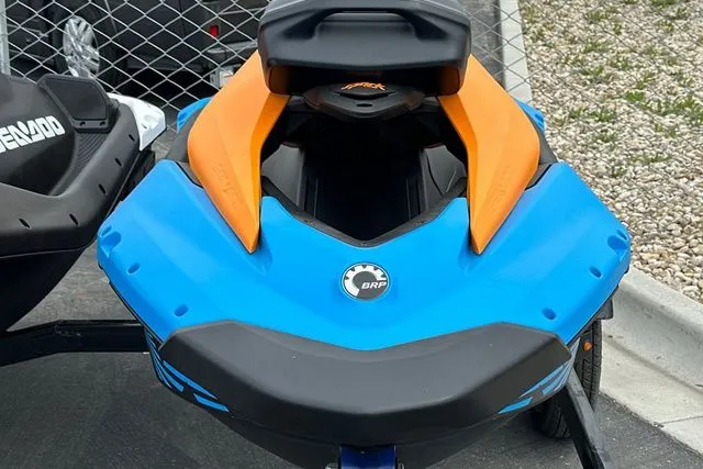 Slide: The Image of 2026 Sea-Doo PWC SPARK TRIXX 90 in blue and orange. - 23