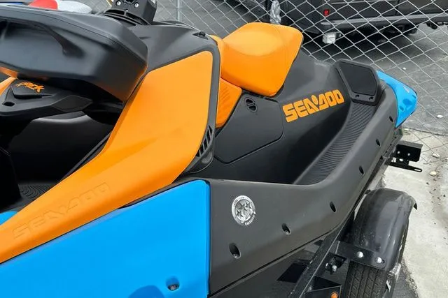 Slide: The Image of 2026 Sea-Doo PWC SPARK TRIXX 90 in orange and blue. - 24