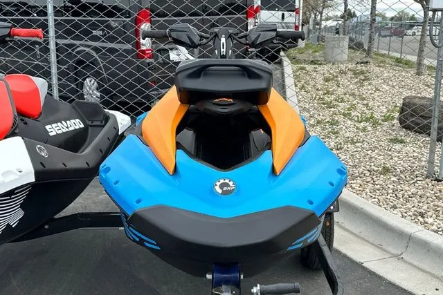 Slide: The Image of 2026 Sea-Doo PWC SPARK TRIXX 90 in blue and orange. - 3