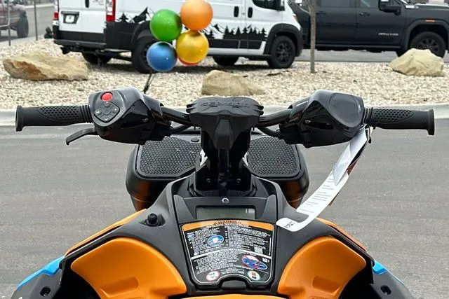 Slide: The Image of Handlebars of a 2026 Sea-Doo SPARK TRIXX with colorful balloons in the background. - 30