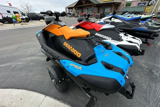 Slide: The Image of 2026 Sea-Doo SPARK TRIXX 90 in blue and orange on a trailer. - 5